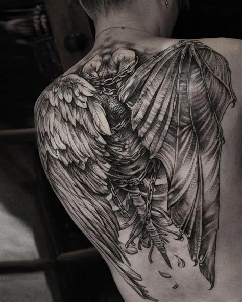 Angel and devil wing tattoo on the back black and white photo large ...