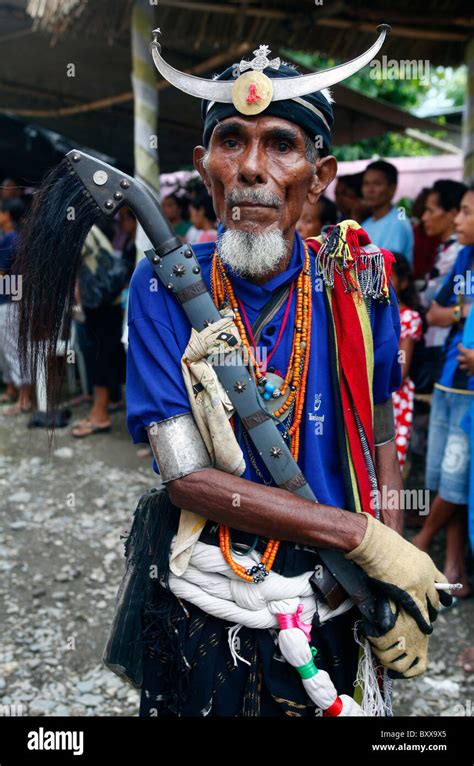 Old man wearing traditional warrior dress, Dili, Timor Leste (East ...