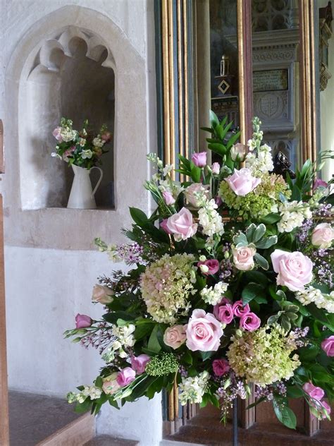 Vintage church flowers in Wellow, Bath. I like the jug in the niche complementing the main ...