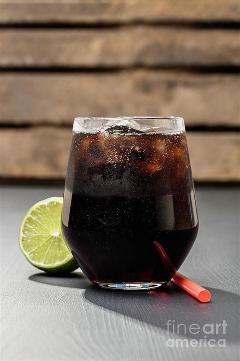 Glass of coca cola with ice cubes Photograph by B-d-s - Fine Art America