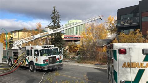 Emergency crews respond to house fire in downtown Yellowknife | CBC News