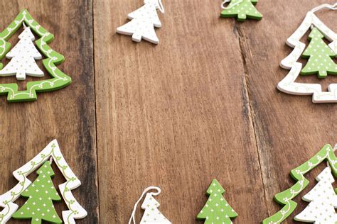 Photo of Festive frame of green Christmas tree ornaments | Free christmas images