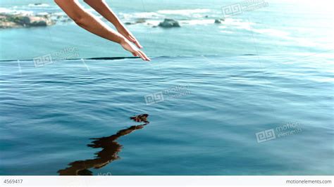 Woman Diving Into The Water In Slow Motion Stock video footage | 4569417