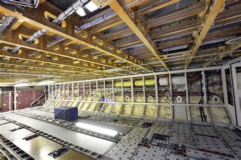 Airplane construction in a hangar stock photo