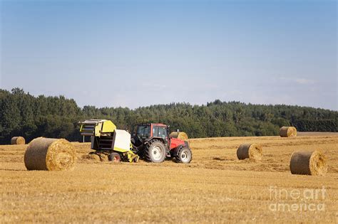 Tractor Harvesting Hay Photograph by Jaak Nilson - Fine Art America