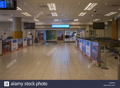 open sliding doors at domestic arrivals hall in the terminal building ...