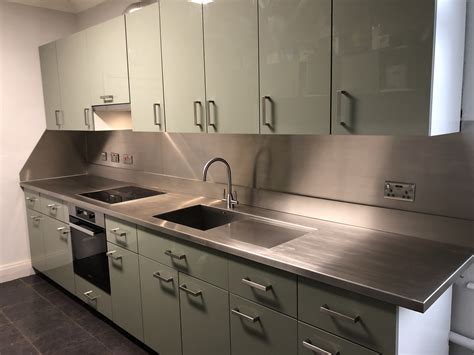 Stunning full height stainless steel splashback. | Stainless steel ...