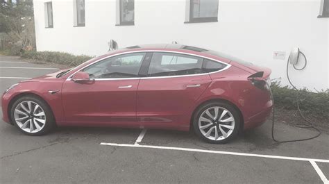 A European Model 3 spotted charging at Tesla Grohmann in Germany