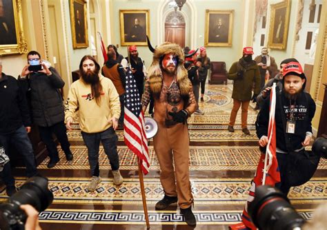 'QAnon Shaman,' Capitol rioter who wore horns, pleads guilty