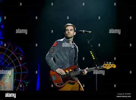 Guy Berryman Coldplay performing live at the O2 in London London, England - 10.12.11 Stock Photo ...