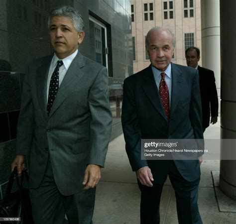 Former CEO of Enron, Ken Lay, walks into the Federal Courthouse for a ...