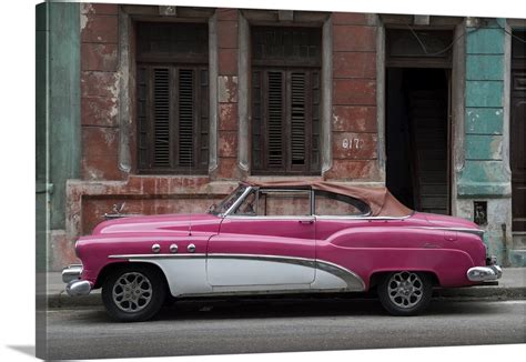 1950s Classic American Pink Car Set Against A Traditional Cuban House ...