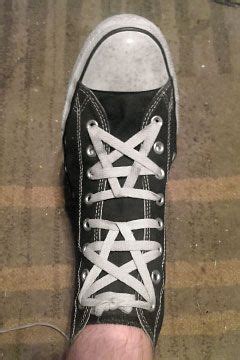 Black Converse hi-tops with white trim and white Pentagram Lacing (from Zachariah K). Both a ...