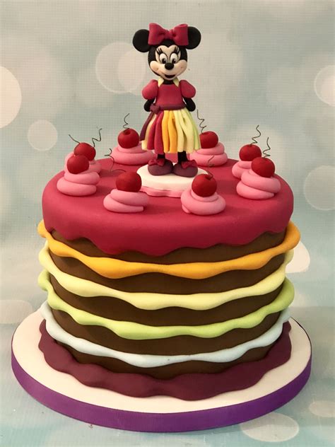 Minnie Mouse rainbow birthday cake with drippy icing and cherries ...