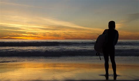 Surfer Girl silhouette at sunset | Nathan Rupert | Flickr