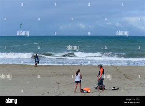 Surfing and kitesurfing at Dorado, Puerto Rico. Caribbean Island. US territory Stock Photo - Alamy