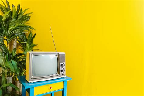 Gray Television on Blue Wooden Table · Free Stock Photo