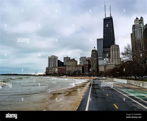 Chicago's lakefront bicycle path and seawall during high waves and storm surge Stock Photo - Alamy