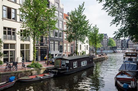 Amsterdam canal editorial stock image. Image of urban - 49579449