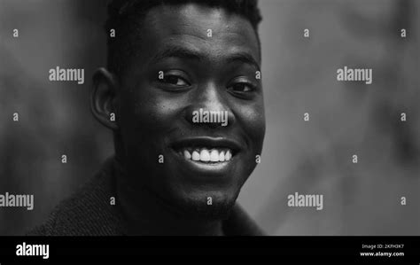 Happy African man smiling at camera, black and white monochrome Stock Photo - Alamy