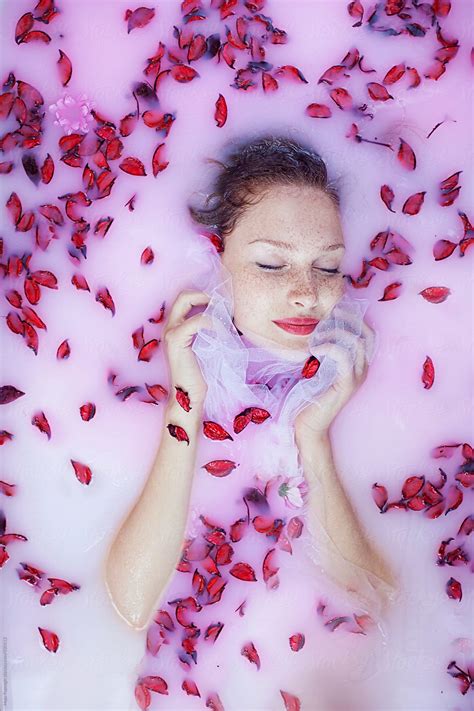 "Portrait Of A Beautiful Redhead With Freckles Having A Milk Bath" by Stocksy Contributor "Maja ...