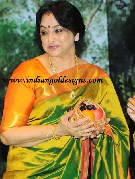 Gold and Diamond jewellery designs: actress lakshmi in diamond pendant