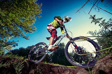 Mountain Bike Cyclist Doing Wheelie Stunt on a Mtb Bike Editorial Stock ...