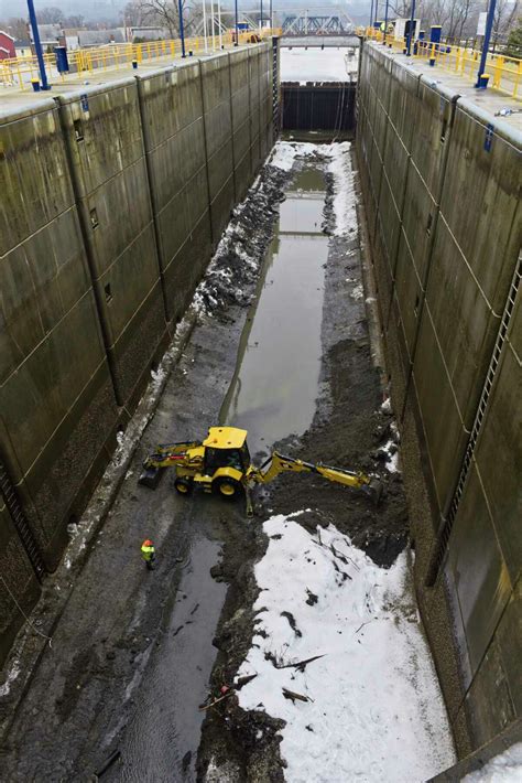 Workers give canal lock a big lift