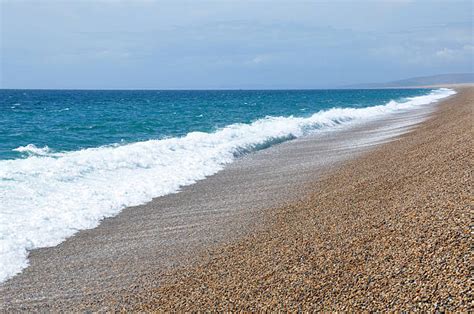 Chesil Beach Stock Photos, Pictures & Royalty-Free Images - iStock