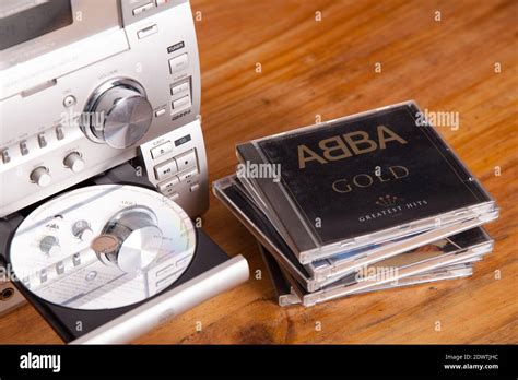 Music CD in Sony hi-fi system, ABBA Gold Greatest Hits album compact disc Stock Photo - Alamy