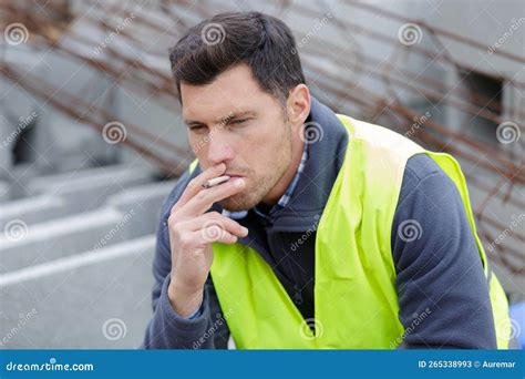 Smoking Cigarette on Construction Site Stock Image - Image of uniform, roadblock: 265338993