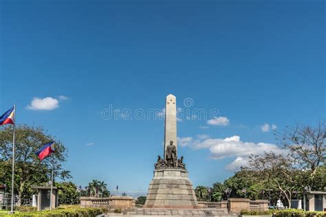 Wide shot of Rizal Monument at Rizal Park in Manila Philippines img