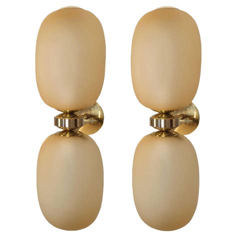 Mid-Century Modern amber Murano glass and brass sconces - a pair For Sale at 1stDibs