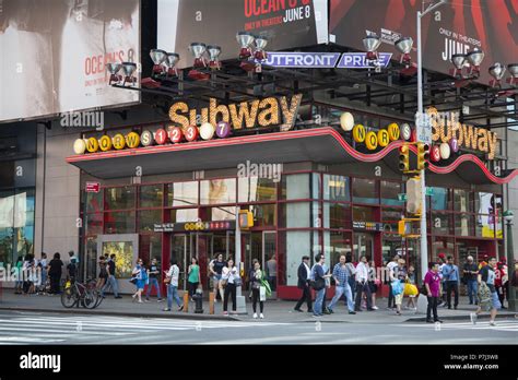 Entrance to the large 42nd Street Times Square Subway Station in midtown Manhattan Stock Photo ...