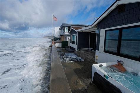 Massive waves on California coast cause flooding, force evacuations ...