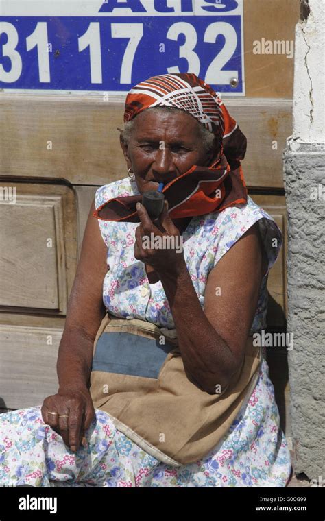 Old Woman smoking pipe Stock Photo - Alamy