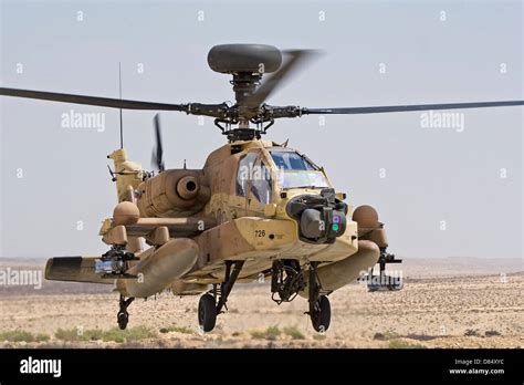 An AH-64D Saraf attack helicopter of the Israeli Air Force landing at Ramon Air Force Base ...