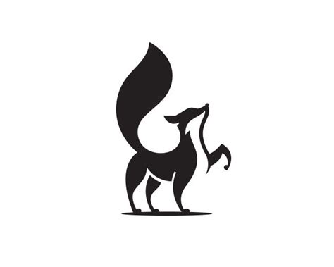 a black and white silhouette of a fox with its tail up, standing on one leg