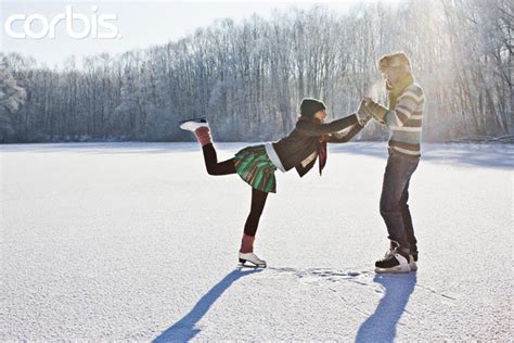 Couple Ice Skating Together – Photobook Blog