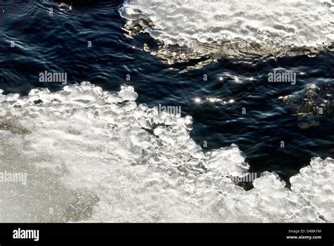 Melting ice in water at Springtime Stock Photo - Alamy