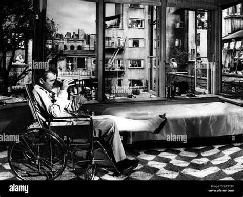 REAR WINDOW, James Stewart, Raymond Burr (center window) 1954 Stock Photo - Alamy