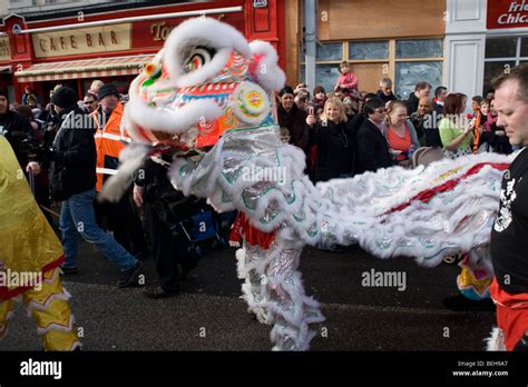 Chinese New Year celebrations in the Chinese quarter of Liverpool featuring a dragon Stock Photo ...