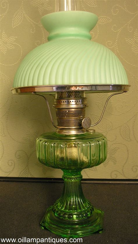 Aladdin green crystal "Cathedral" mantle lamp with satin swirl rib shade. Only made during 1934 ...