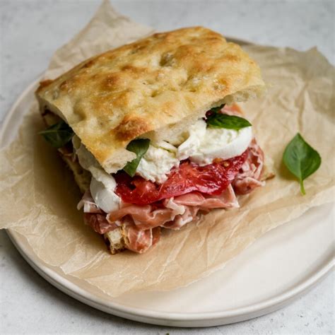 Delicious Prosciutto Sandwich (Panino) With Mozzarella, Tomato and Basil - Pina Bresciani