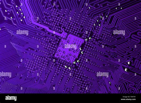 Close up photo of purple pcb printecd circuit board electric paths Stock Photo - Alamy