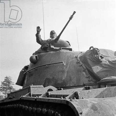 Image of The commander of a Leopard 1 tank of the German