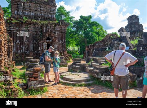 tourists exploring ancient town ruins in My Son, Vietnam Stock Photo - Alamy