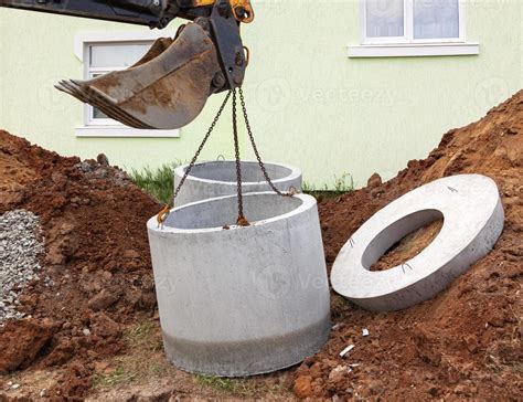 Installation of underground tank for sewage system 15743172 Stock Photo at Vecteezy