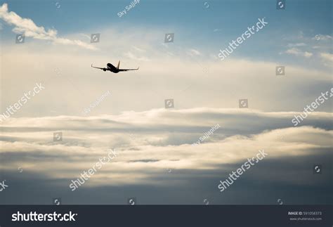 Silhouette Airplane Flying Sky Surround By Stock Photo 591058373 ...