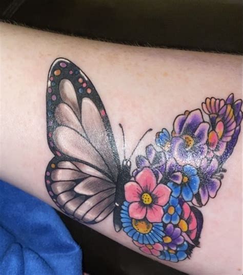 Colorful butterfly flower tattoo | Flower tattoo, Purple butterfly ...